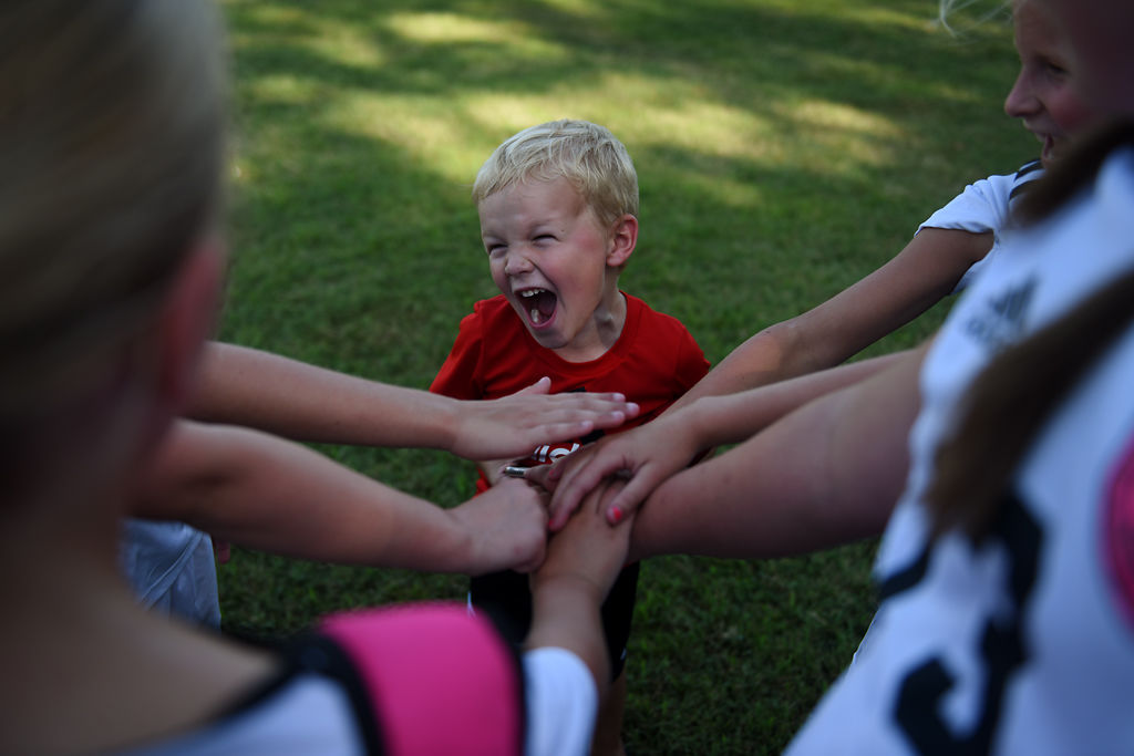 Trever Hill, 4, asks the remaining members of the Hannibal Honey Badgers to let him be part of their team